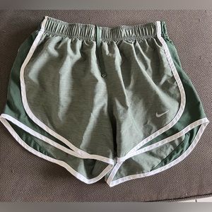 Green Nike running shorts